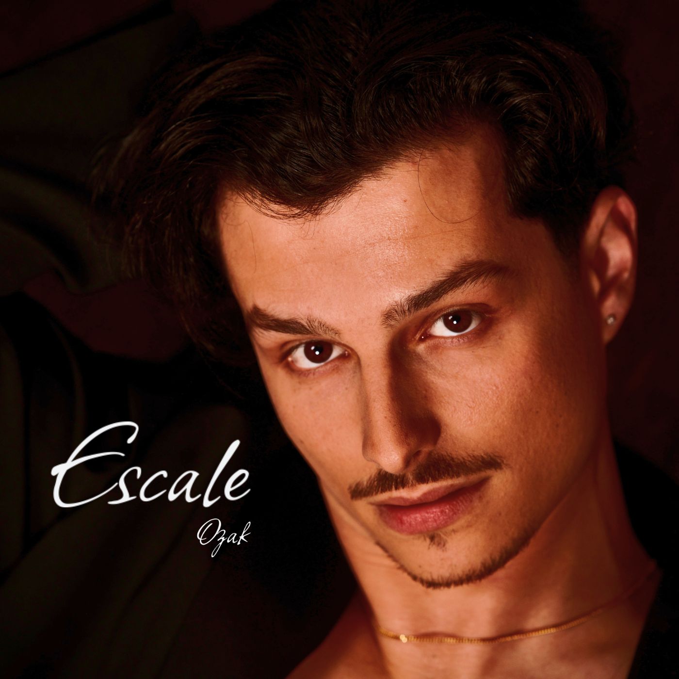Ozak Creates a Romantic Summer Atmosphere with Afro-Pop Single “Escale”